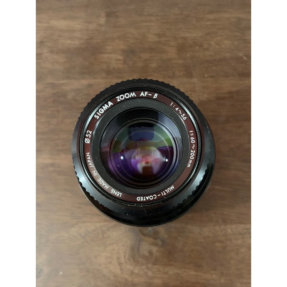 Minolta Maxxum 7000 AF 35mm SLR Camera with 50mm and Sigma 60-200mm Lense Manual